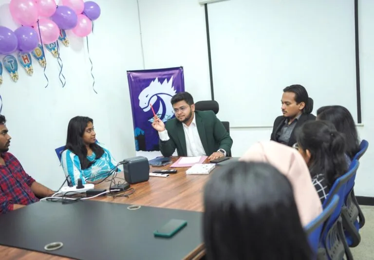 Codezela team collaborating during a strategy meeting